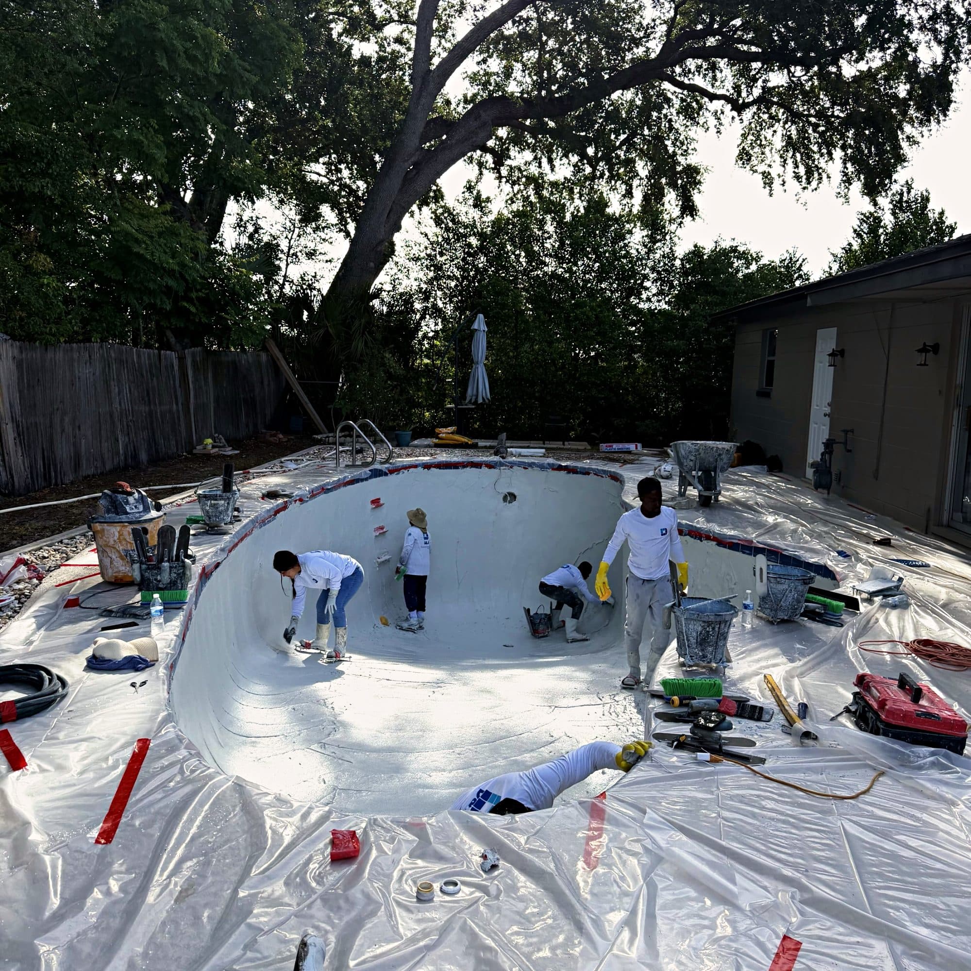 Finishing a freeform pool by hand