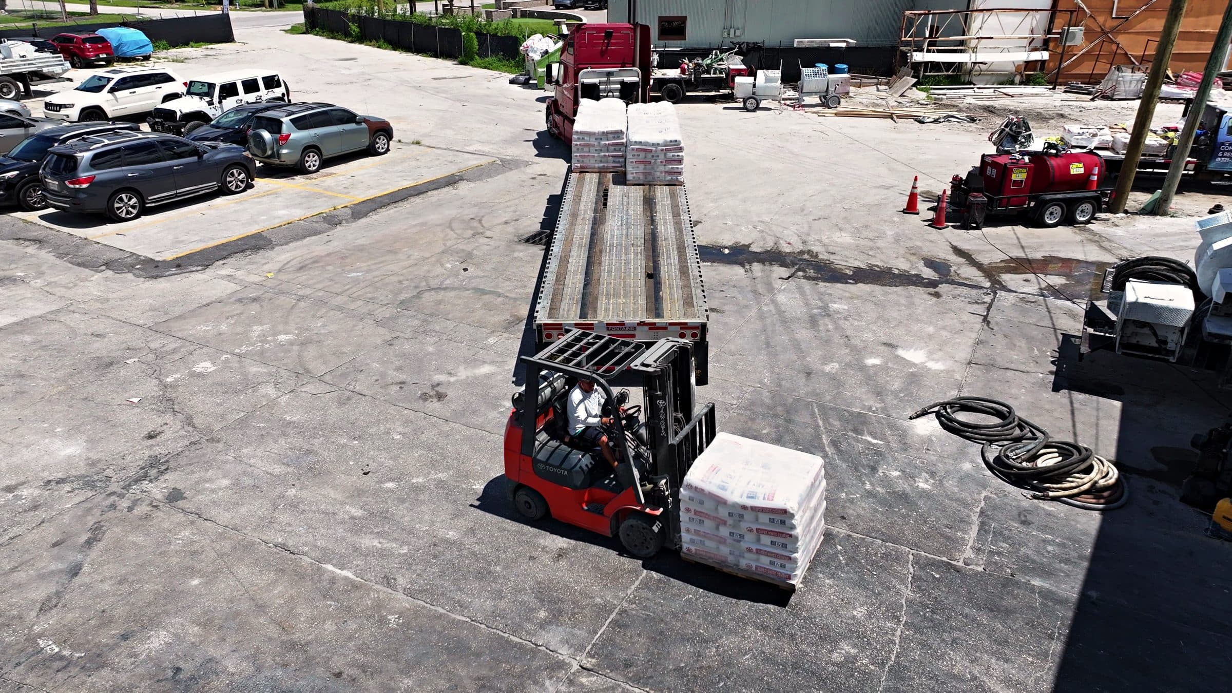 Unloading a material delivery with the forklift at D&J's yard
